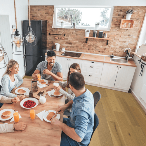 Family having breakfast together at home | UCX