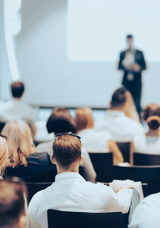 Speaker giving a talk in conference hall at business event | UCX